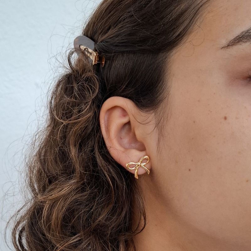 Brinco Laço de Fita em Aço Inoxidável